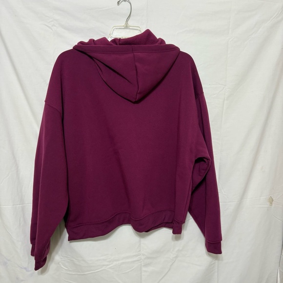 Disney purple hoodie featuring a graphic of Mickey and Minnie Mouse. - Picture 5 of 5